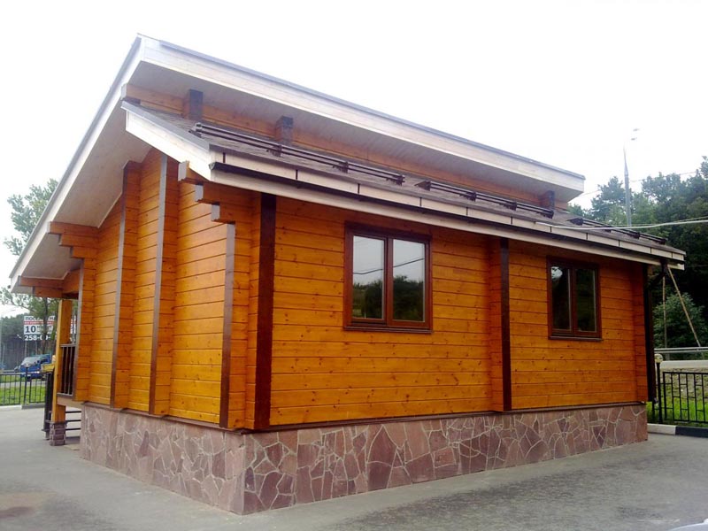 Фото: Отделку деревянного дома можно осуществить при помощи специальных пропиток